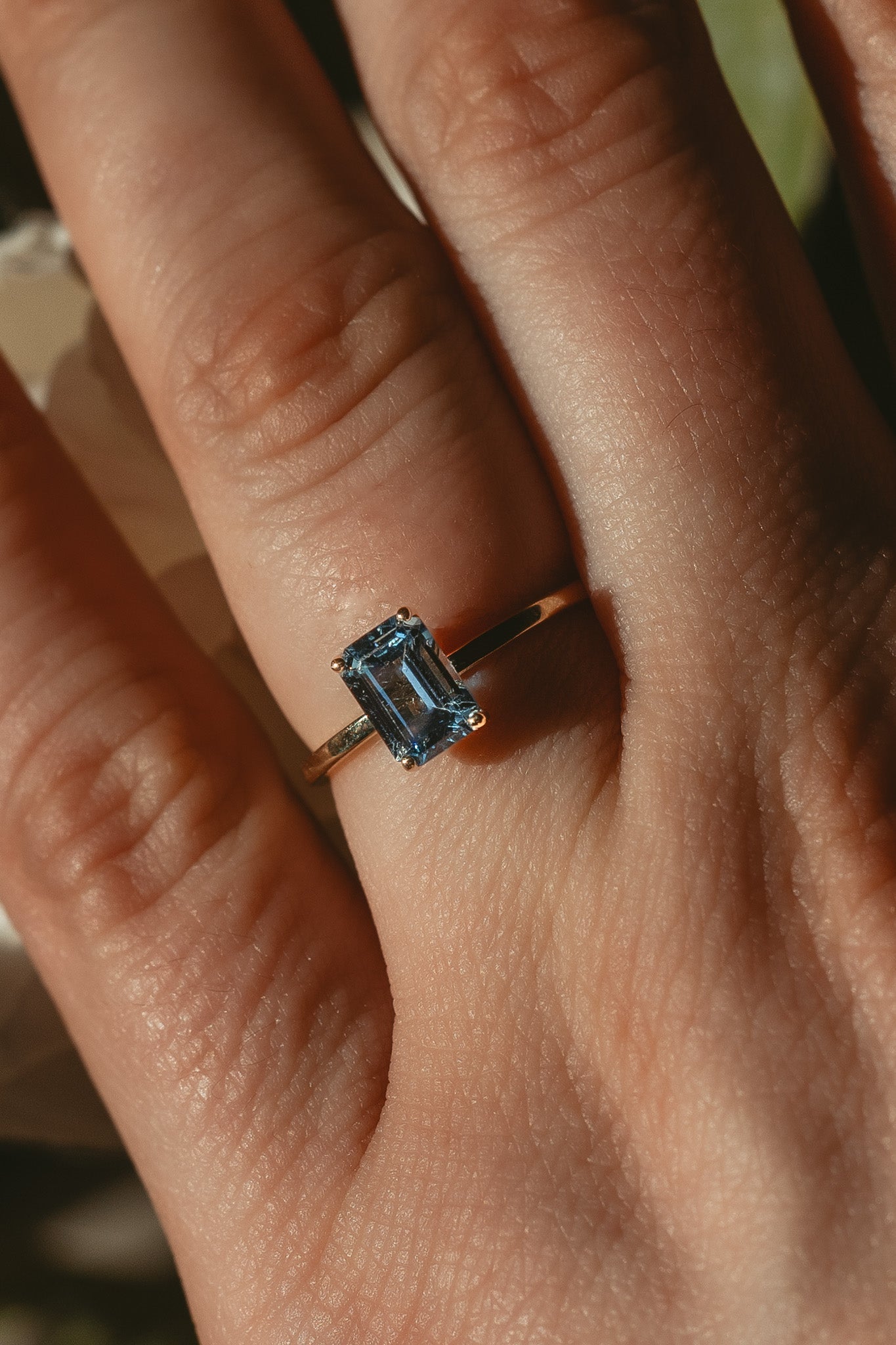 14K Emerald Cut Blue Topaz Solitaire Ring - Cadena Collective